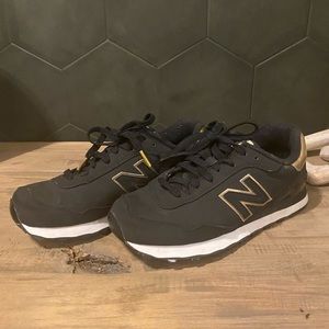 New Balance black & gold